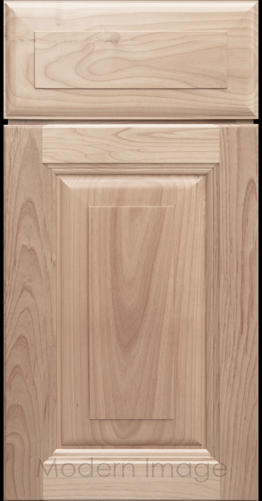 Durango raised panel cabinet door in a Ghost matte stain featuring a stepped molded frame.